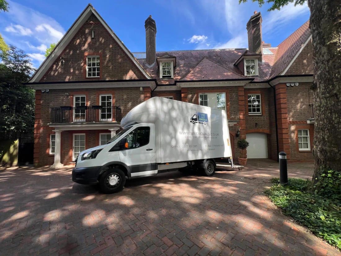A removals van outside a family home